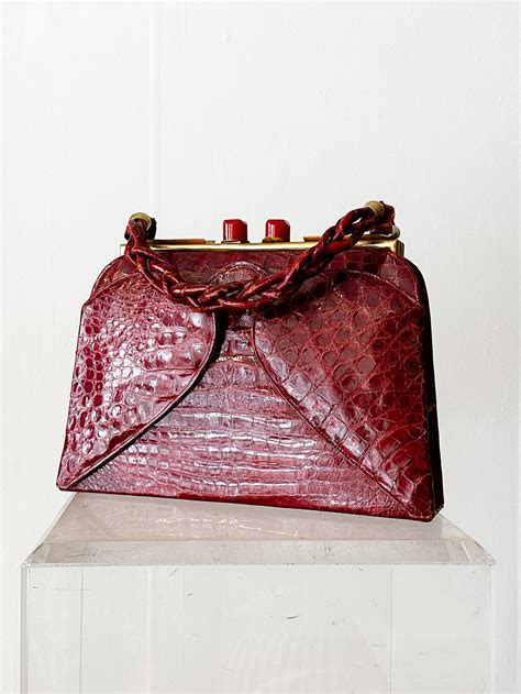 red crocodile bag.